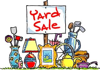 household items outside with a yard sale sign